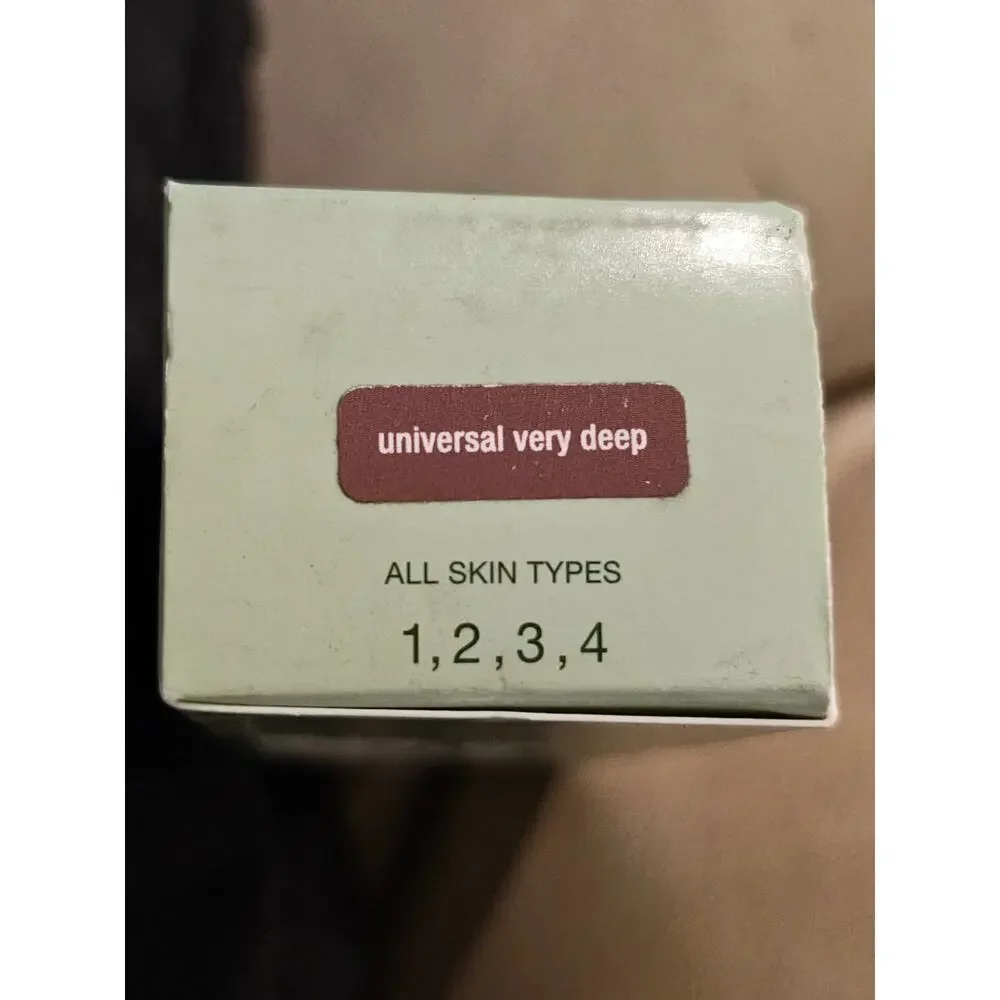 CLINIQUE moisture surge sheertint hydrator broad spectrum SPF 25